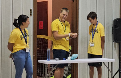 Staff doing a demonstration for children