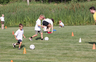 Kids playing soccer